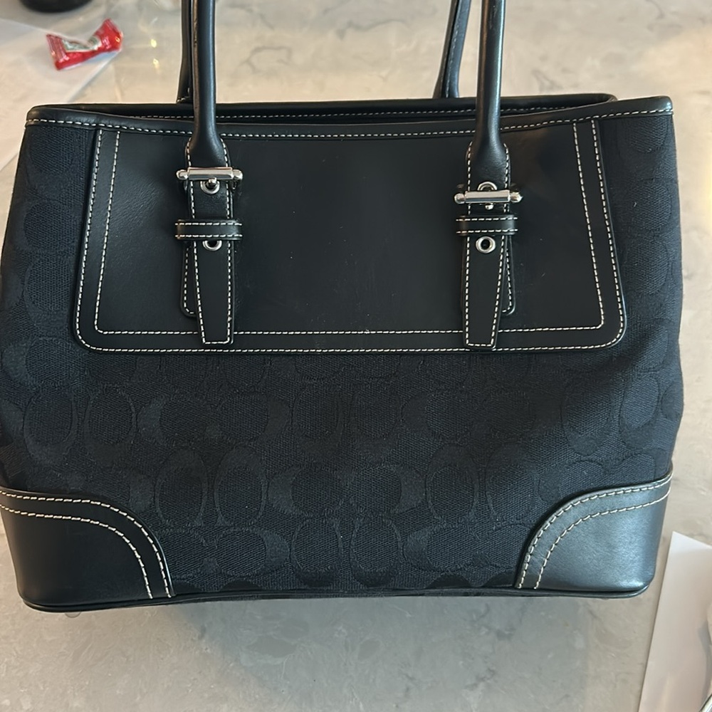 Coach signature small black canvas and leather hamptons satchel.